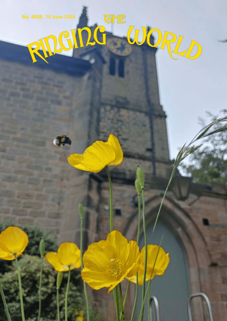 A bumble bee hovers by the bright yellow Welsh poppies on the edge of Dore churchyard. The tower, which contains 8 bells, is in soft focus in the background.